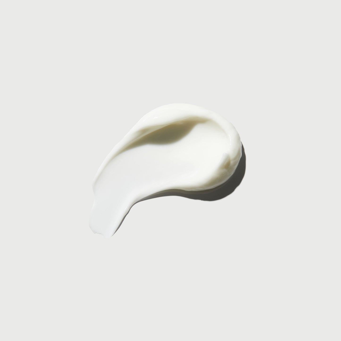 the-smoother-glycolic-acid-body-lotion-j0 NATR-40014-Swatch-The-Smoother-Glycolic-Acid-Body-Lotion-bonebkgd.jpg