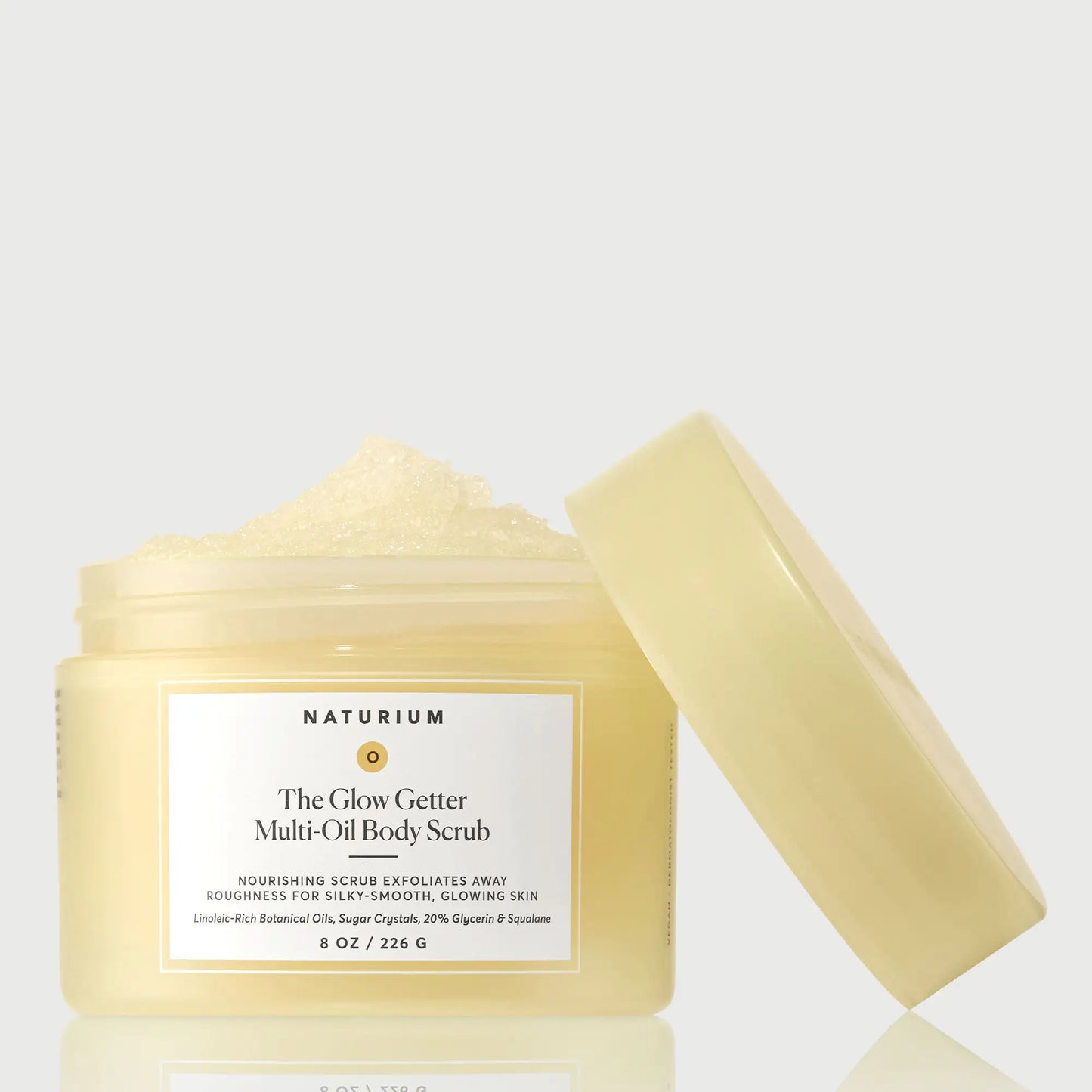 the-glow-getter-multi-oil-body-scrub-k4 NATR-40028-GlowGetter-Multi-Oil-Body-Scrub-Front-CapOff-bonebkgd.webp